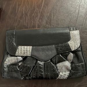 Black and silver leather clutch